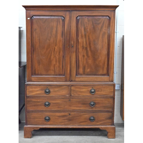 486 - A 19th century mahogany wardrobe/compactum, the top with panelled doors enclosing hanging rail on ch... 