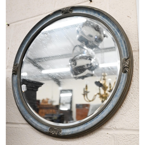 491 - # A 1950s bevelled circular wall mirror, 45 cm diam