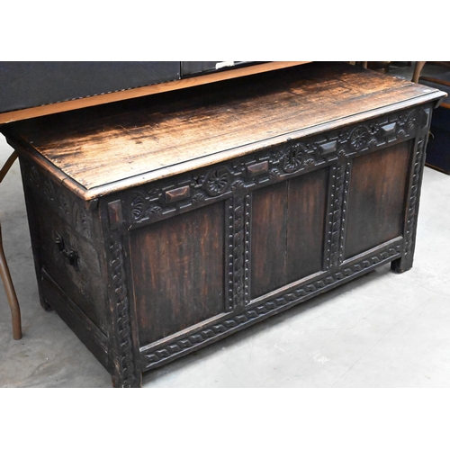 494 - Antique carved and panelled oak coffer with candle box fitted interior, 126 cm wide x 58 cm deep x 6... 