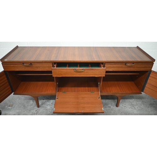 497 - A mid century Meredew rosewood sideboard circa 1960, the drawers and panelled cupboards fitted with ... 