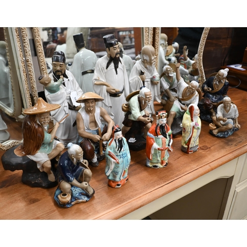 50 - Fourteen various Chinese porcelain and glazed earthenware figures