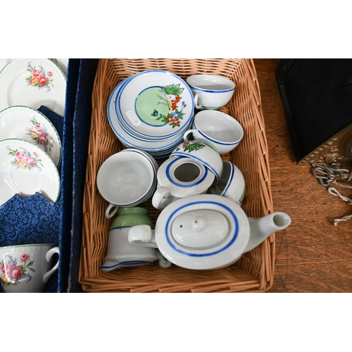 51 - A child's floral-painted tea set in original box to/w a Chinese toy tea set (2)