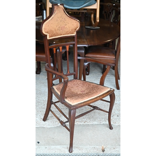 510 - # An Art Nouveau walnut framed part upholstered open armchair