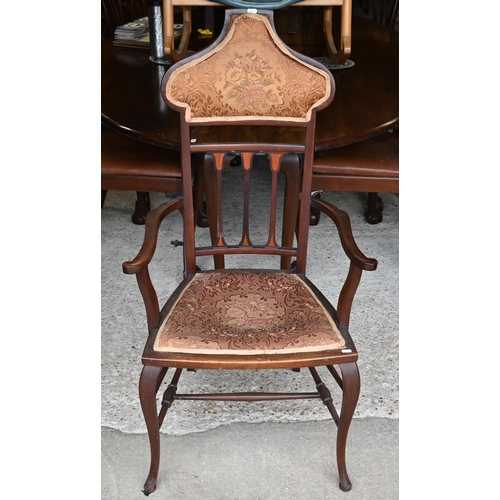 510 - # An Art Nouveau walnut framed part upholstered open armchair