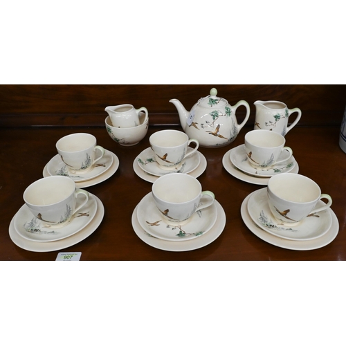 61 - Royal Doulton pottery tea service, printed with 'The Coppice' D5803 (22 pieces)