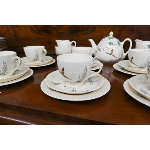 61 - Royal Doulton pottery tea service, printed with 'The Coppice' D5803 (22 pieces)