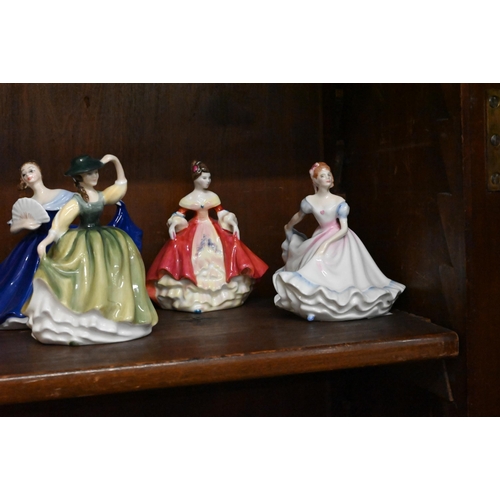 74 - Eleven Royal Doulton small figures of ladies (each 9-10 am high) to/w six miniature examples (5.5 cm... 