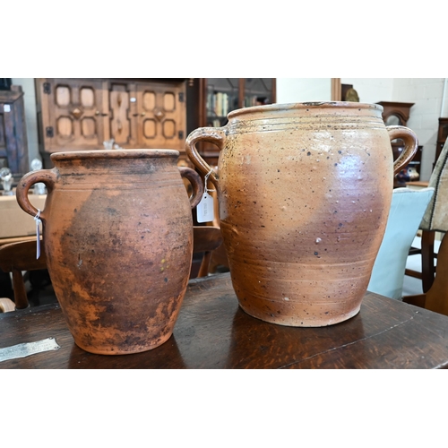 83 - Two stoneware crocks, 36/32 cm high