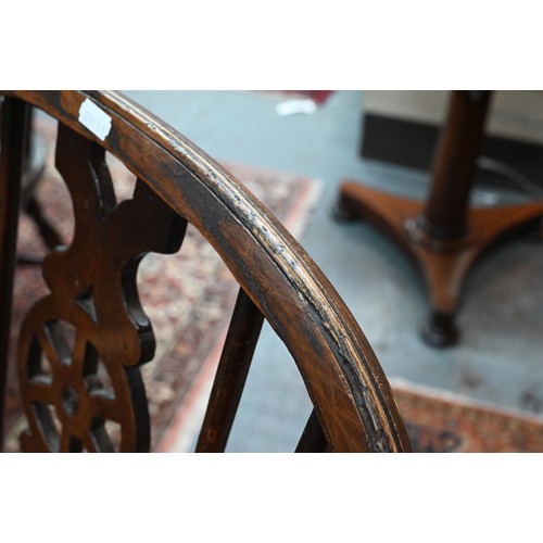 940 - A set of six oak and elm hoop and Windsor dining chairs, raised on crinoline stretchers, comprising ... 