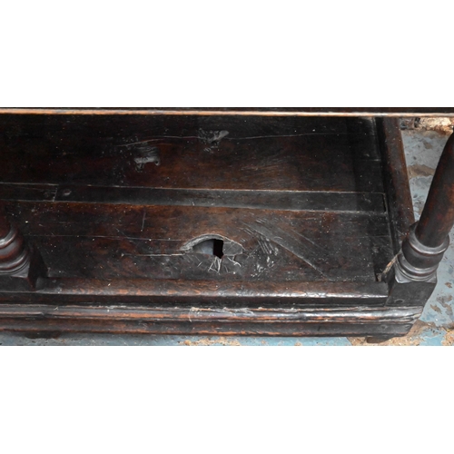 970 - An 18th century oak three drawer dresser, with associated rack (reduced in height), with planked pot... 