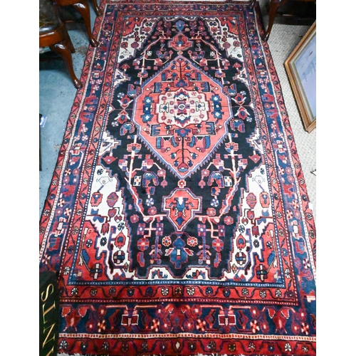 1058 - A North West Persian Nahawand carpet, 295 cm x 152 cm