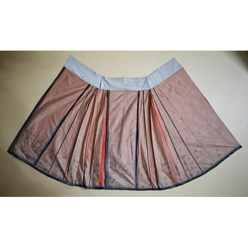 510A - A 19th century Chinese bridal apron-skirt, pleated brocade red silk with metallic thread embellishme... 