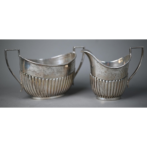 101 - A heavy quality half-reeded silver milk and sugar pair, John Henry Potter, Sheffield 1910, 13.2oz, t... 