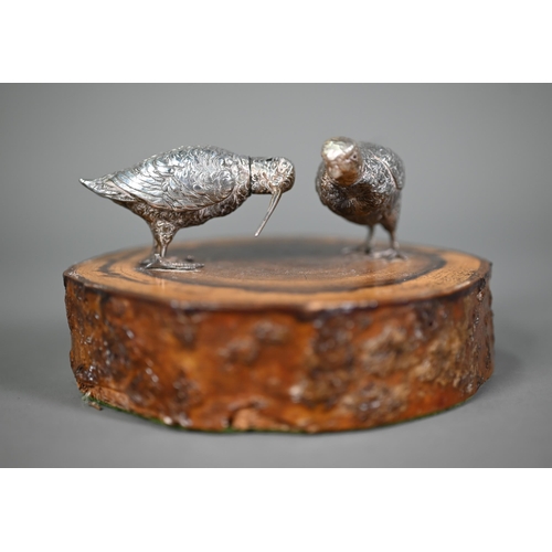 102 - Two miniature silver birds - woodcock and grouse - with detachable heads, 3.5cm high approx., mounte... 