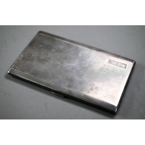 105 - Heavy quality engine-turned silver cigarette case, Birmingham 1950, 6.5oz