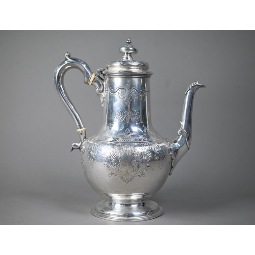 110 - Victorian silver baluster coffee pot with engraved decoration and scroll handle with ivory insulator... 