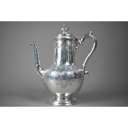 110 - Victorian silver baluster coffee pot with engraved decoration and scroll handle with ivory insulator... 