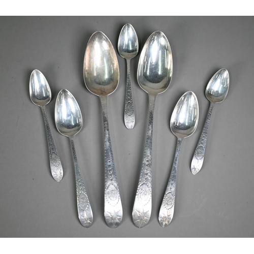 117 - Pair of George III Irish silver tablespoons with bright-cut stems, to/w two matching dessert spoons ... 