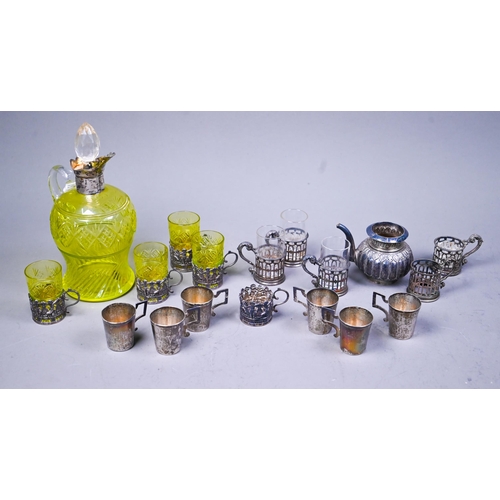 119 - An Edwardian silver-mounted cut uranium glass liqueur decanter and four matching glasses in pierced ... 