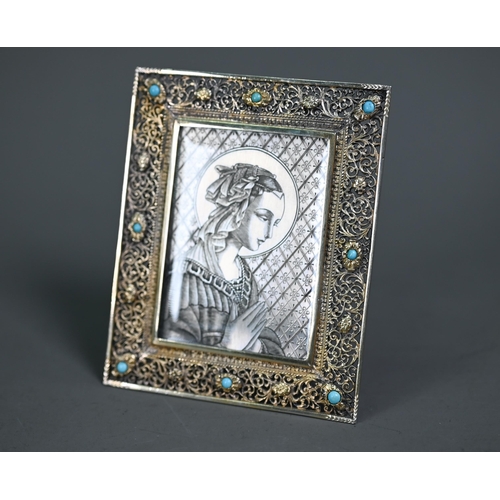 140 - A 19th Century Continental silver gilt pocket icon, engraved with the Madonna after Fra Lippi, in gl... 