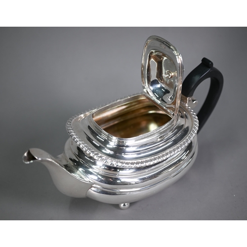 175 - A heavy quality silver three-piece tea service in the Regency manner, of compressed oblong form with... 