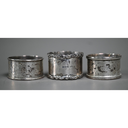 215 - A late Victorian silver seven-piece condiment set (a/f), Sheffield 1896, to/w three napkin rings and... 