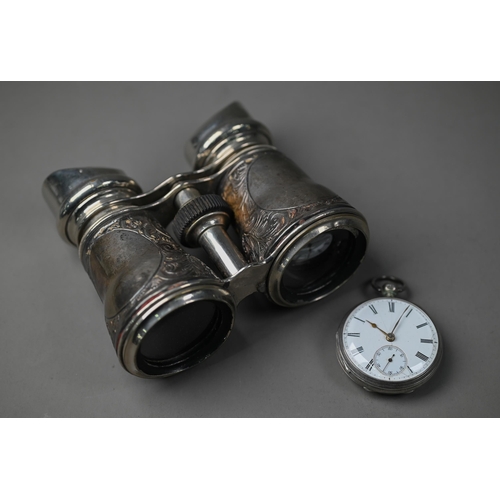 217 - An Edwardian pair of binoculars with embossed silver cladding, London 1904, to/w a Victorian silver ... 