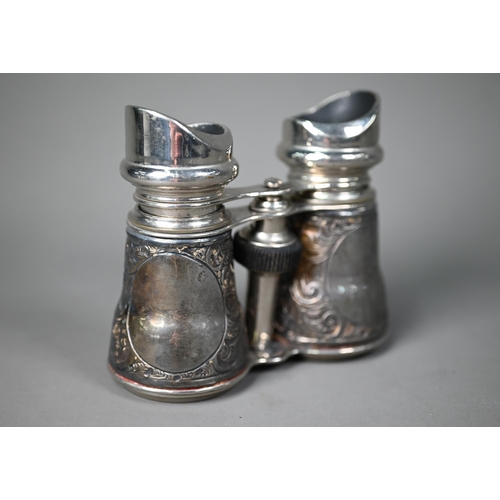 217 - An Edwardian pair of binoculars with embossed silver cladding, London 1904, to/w a Victorian silver ... 