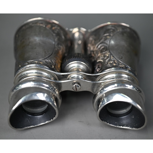 217 - An Edwardian pair of binoculars with embossed silver cladding, London 1904, to/w a Victorian silver ... 