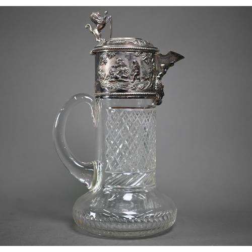 222 - A Victorian cut glass claret jug with electroplated collar and cover surmounted by a rampant lion su... 