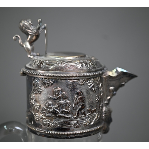 222 - A Victorian cut glass claret jug with electroplated collar and cover surmounted by a rampant lion su... 