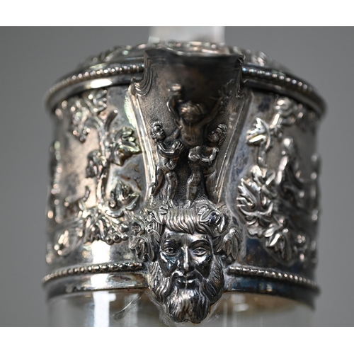 222 - A Victorian cut glass claret jug with electroplated collar and cover surmounted by a rampant lion su... 