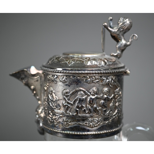 222 - A Victorian cut glass claret jug with electroplated collar and cover surmounted by a rampant lion su... 