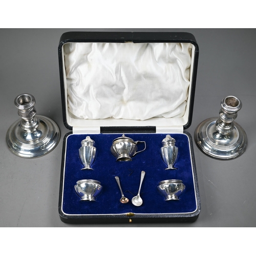 225 - A pair of loaded silver short candlesticks in the 18th century manner, William Comyns & Sons Lim... 