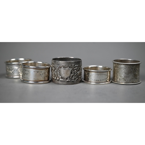 227 - A 19th Century Chinese export silver napkin ring, embossed and chased with busy battle scene, signed... 