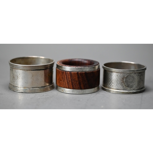 227 - A 19th Century Chinese export silver napkin ring, embossed and chased with busy battle scene, signed... 