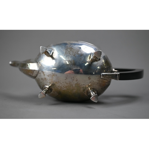 230 - A heavy quality silver bachelor teapot of ovoid form, with composite handle and finial, on hoof feet... 