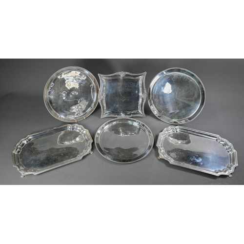 24 - A pair of electroplated salvers with moulded rims and claw feet, 42 x 28cm, to/w another salver 28cm... 