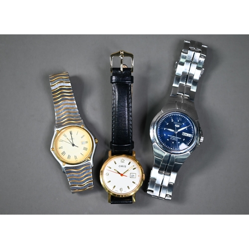 248 - A Seiko 5 wristwatch, stainless steel, blue calendar to/w an Oris gold plated calendar dial wristwat... 