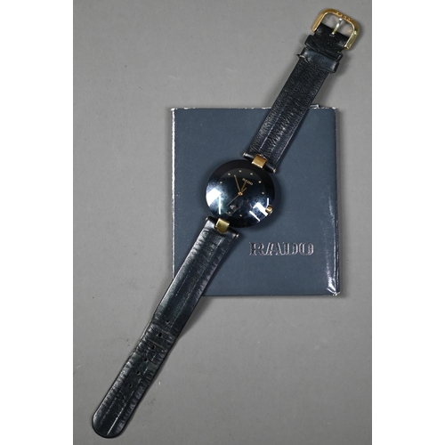 249 - WITHDRAWN A Rado Dia Star wristwatch, black dial and gilt, with black leather strap, c/w documents, ... 