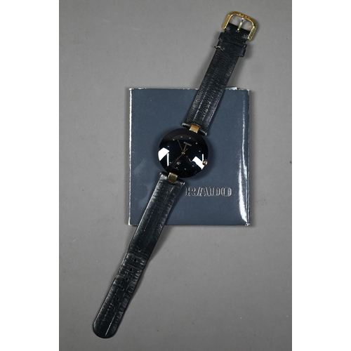 249 - WITHDRAWN A Rado Dia Star wristwatch, black dial and gilt, with black leather strap, c/w documents, ... 