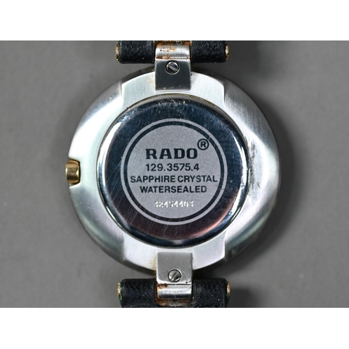 249 - WITHDRAWN A Rado Dia Star wristwatch, black dial and gilt, with black leather strap, c/w documents, ... 