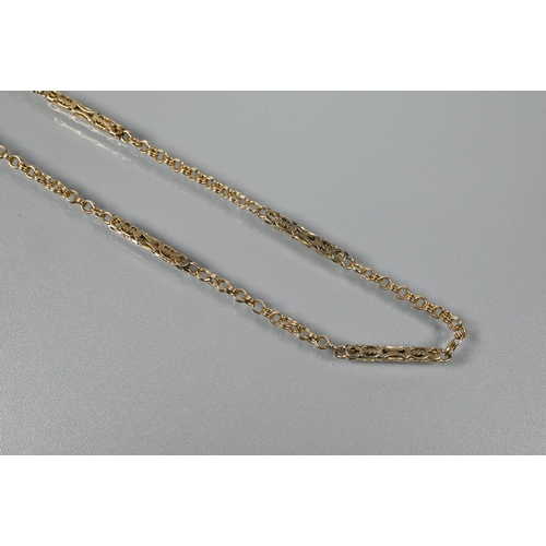 315 - A 9ct yellow gold fancy link chain with alternate square-sided links with pierced decoration and cha... 