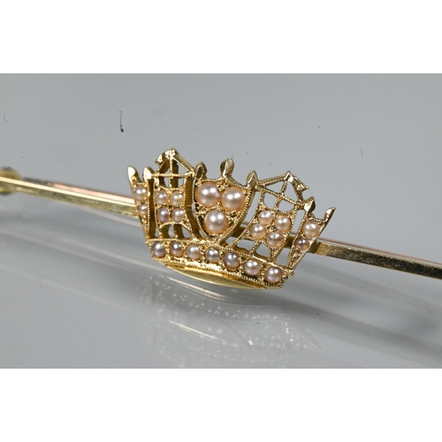321 - A yellow metal seed pearl set coronet bar brooch, stamped 14ct, 5.5 cm long, approx 3.5 g all in