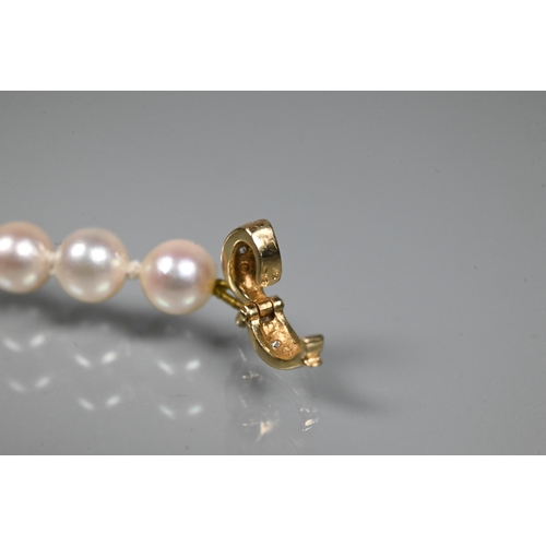 337 - WITHDRAWN A cultured pearl bracelet, the uniform pearls double knotted throughout onto yellow metal ... 