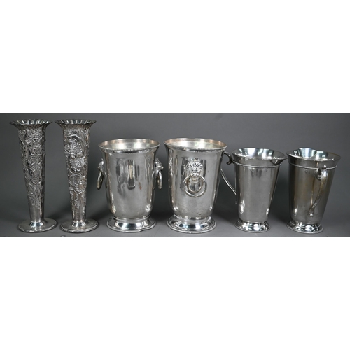 34 - A quantity of electroplated wares, including a pair of flute vases, pair of ice buckets, pair of coc... 