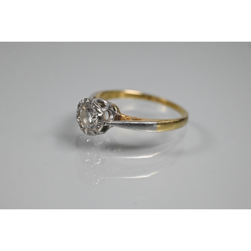 343 - WITHDRAWN A single stone diamond ring, the diamond in rubover setting, platinum and 18ct yellow gold... 