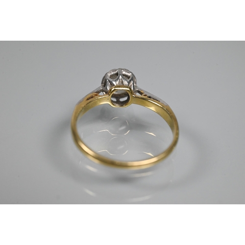 343 - WITHDRAWN A single stone diamond ring, the diamond in rubover setting, platinum and 18ct yellow gold... 