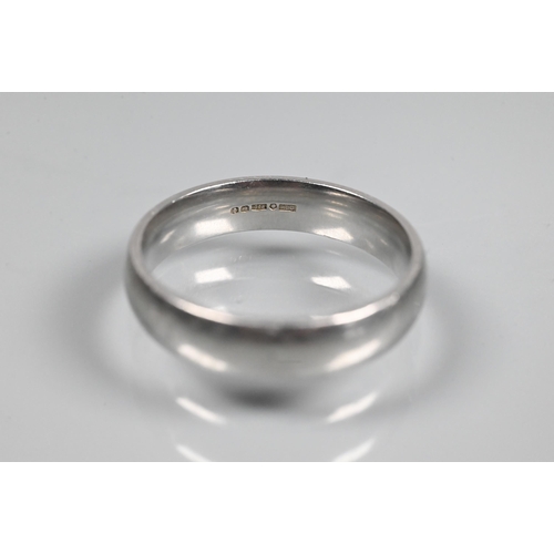 349 - A wide platinum wedding band, size V, approx 11g