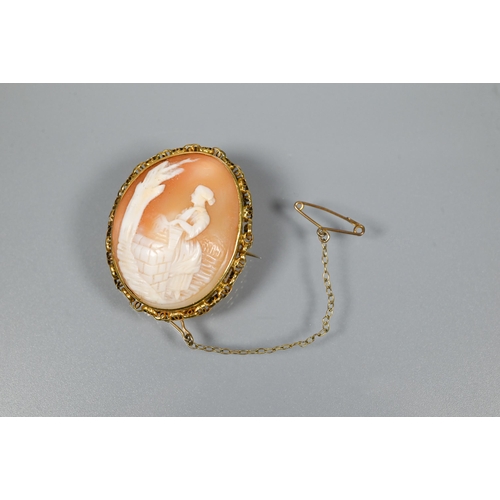 352 - An oval shell cameo brooch featuring Rachel at the well, in belcher-chain style mount stamped 9ct, f... 